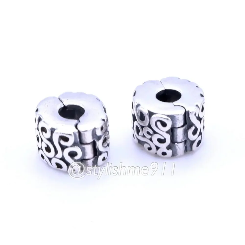 Two Authentic PANDORA Silver Swirls Clips Charms - 790338